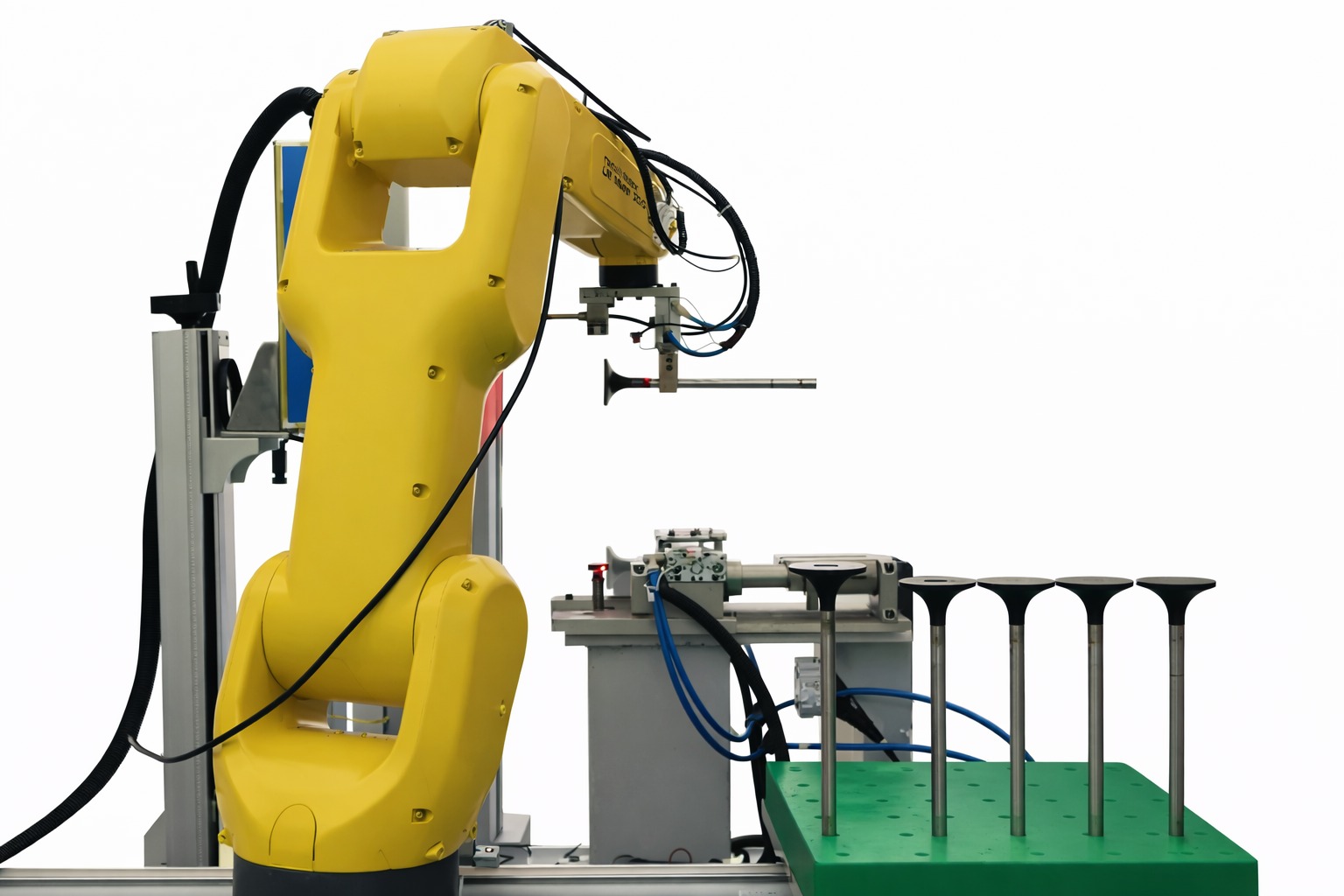 Robot picking valves at the inspection station